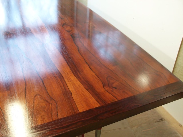 Close up view of grain and color of 20 foot exotic conference table.jpeg